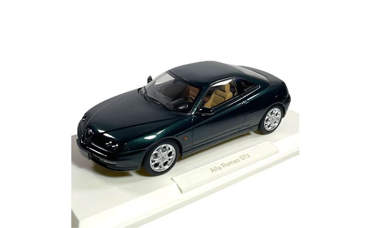 1:18 1/18 Alfa Romeo GTV 916 Kupe 1999 2003 tamno zeleni Norev